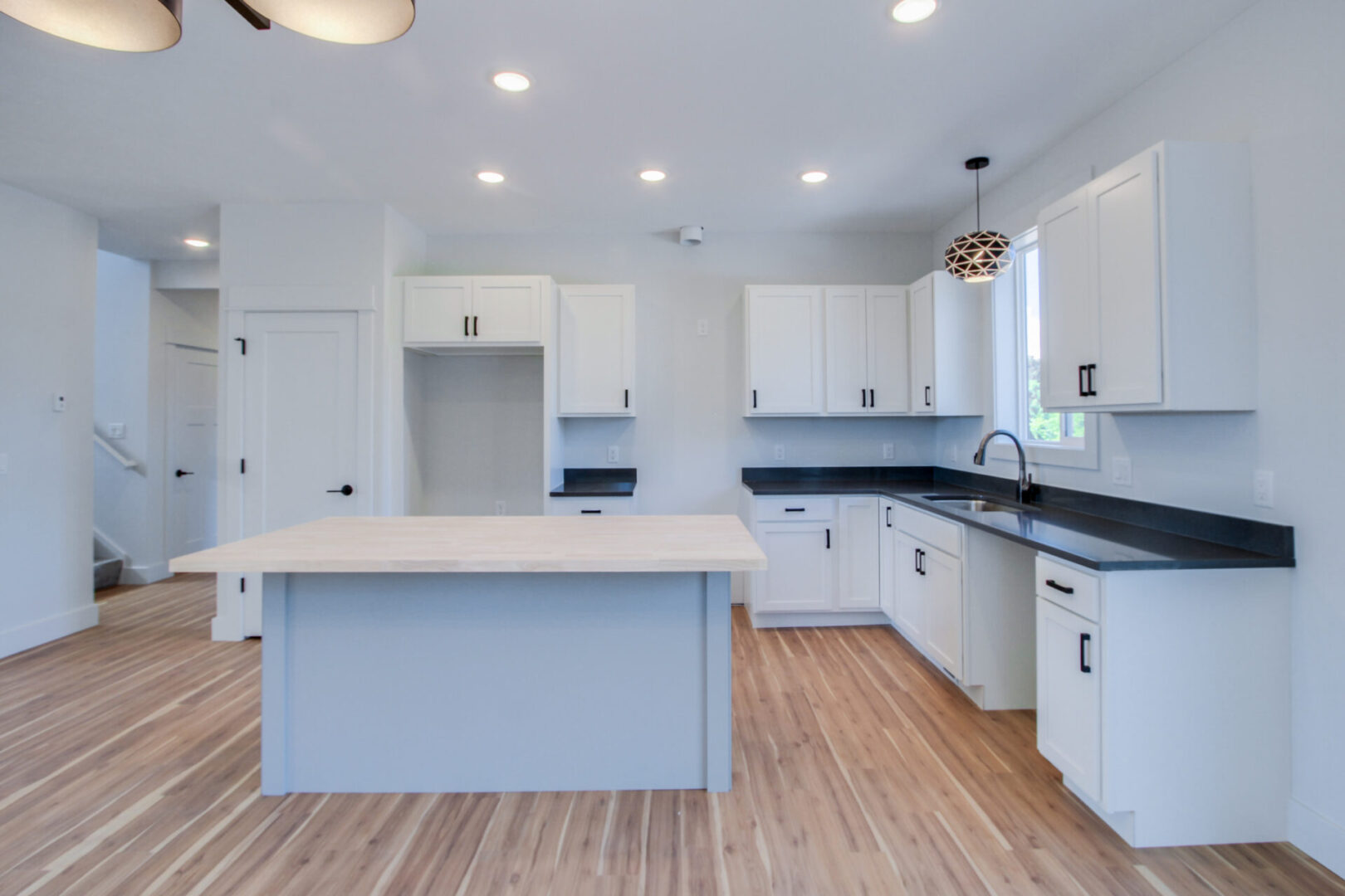 An all-white kitchen, angle 3